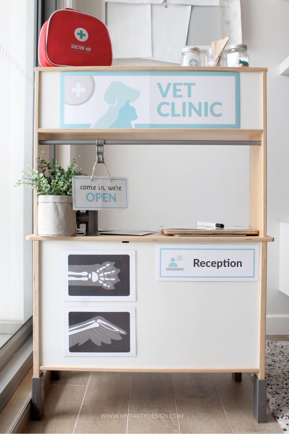 vet clinic dramatic play on Ikea play kitchen hack