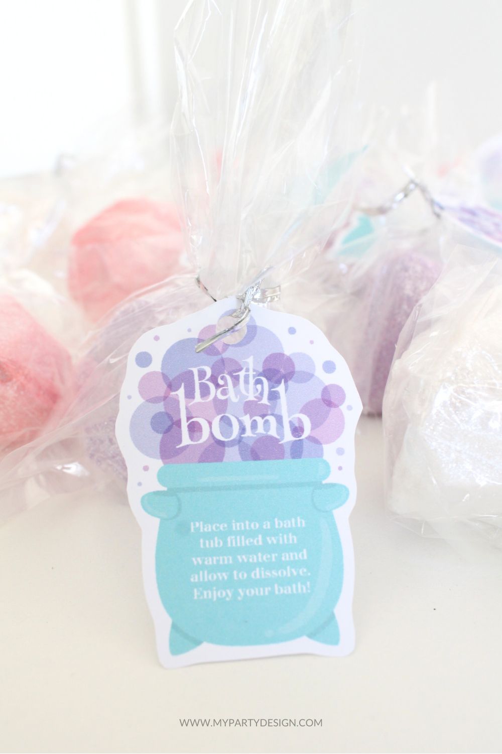 magic potion inspired bath bomb tags in the shape of a bubbling cauldron
