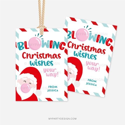blue and red christmas class gift tag that reads "blowing christmas wishes your way", featuring an illustration of santa blowing a pink bubblegum bubble