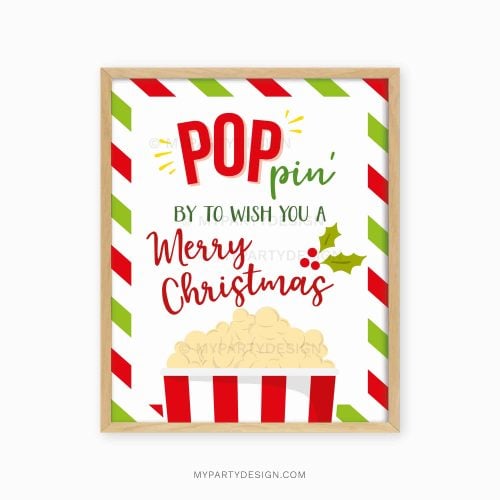 red and green christmas popcorn sign that reads "poppin by to wish you a merry christmas"