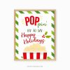 green and red popcorn christmas holidays sign that reads "poppin by to say happy holidays"