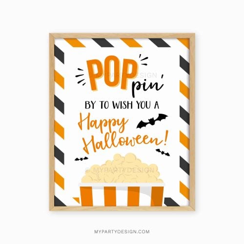 halloween popcorn sign that reads "poppin by to wish you a happy halloween"
