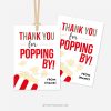 popcorn favour that that reads "thank you for popping by!"