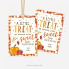 thanksgiving gift tags in orange and brown colors featuring autumn leaves, pumpkin illustrations and words "a little treat for someone extra sweet. happy thanksgiving"