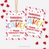 red and pink Valentine's Day labels for cake class gifts that read "valentine, you take the cake!"