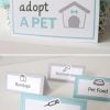 adopt a pet sign and themed folded labels for vet dramatic play scene