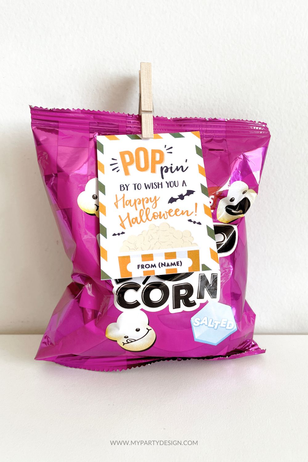pack of popcorn with halloween gift tag for class gifts