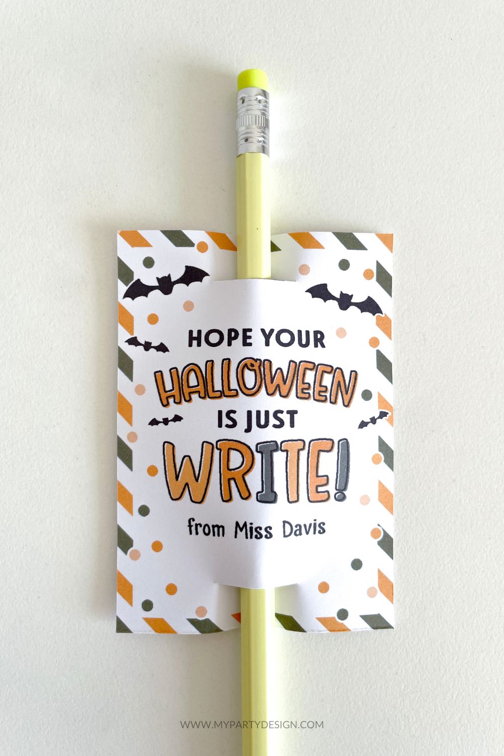 pencil with gift tag that reads "hope you halloween is just write"